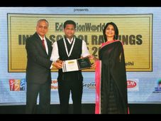 TRIO World School receives an award from Education World