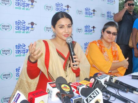 Vidya talking to the media with Pooja Marwaha CRY