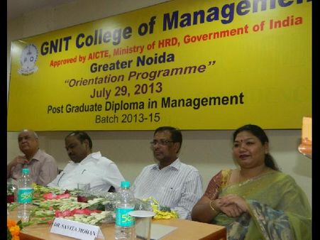 Guests gathering at the dias